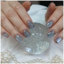 손끝에서 피어나는 네일아트 이미지