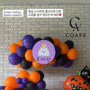 망토 두른 강아지 이미지