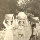 물동이 이고 가는 이미지