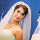 한국의 김철* 님이 우즈베키스탄국제결혼의 아름다운 신부와 국제결혼을 성대하게 올리는 사진입니다. 서로 많이 닮은 신부측 가족과의 사진이 인상이 깊습니다. 이미지