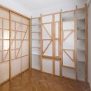 [벽속에 숨어 있는 가구]Tables, benches and an ironing board unfurl from the walls of a Madrid apartment by Elii Architects 이미지