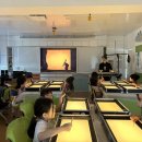 빛과 모래로 그리는 샌드아트 이미지