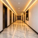 골프존파크 한남리버 | [반포 인테리어] 아크로 리버파크 복도 리모델링: 천연 원목 템바보드와 히든 도어 시공 가이드