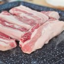 돌판에 누운 오겹살 이미지