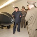 Kim Jong-un reveals nuclear warhead, calls for more weapons-grade material 이미지