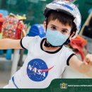 Pre-K students dressed up as little astronauts preparing to embark on... 이미지