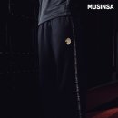 투혼체육관 | 블랙컴뱃 팬츠, 링 위에서의 투혼을 일상으로 가져온 묵직하고 강렬한 실루엣