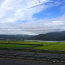 급커브 도로변 마을 이미지