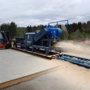 Beaver sawdust machine operating view in Norway. 이미지